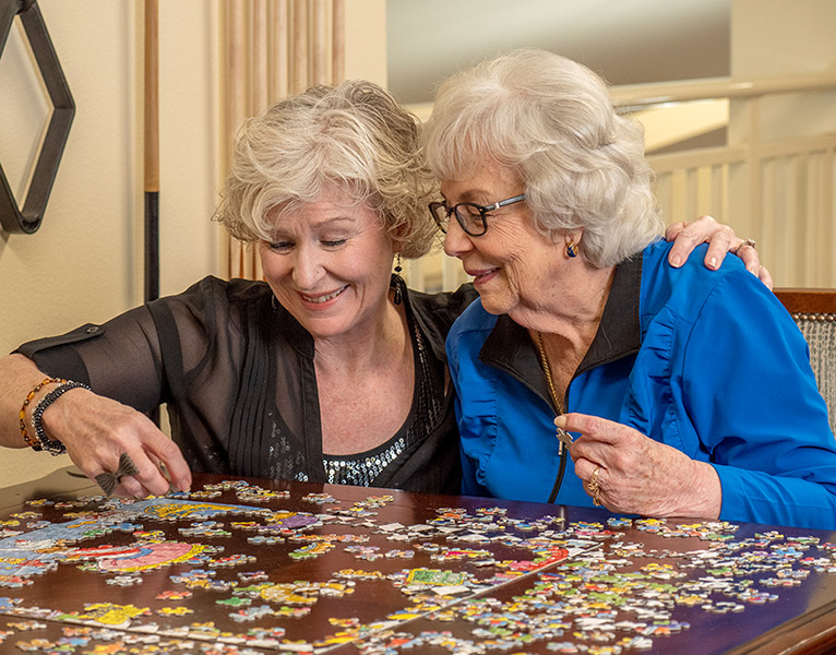 Puzzles with friends at Marlton Gardens