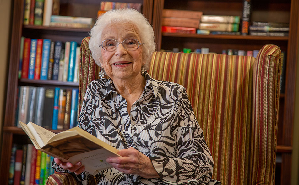 Independent Lindenwold senior reading a book